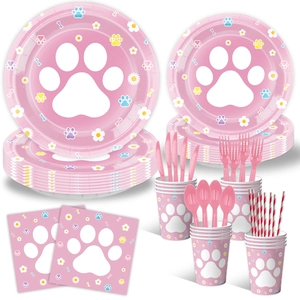 Pink dog paw print disposable party tableware set with plates, cups, and napkins