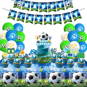 Close-up of football theme birthday party set including banners, balloons and cake toppers