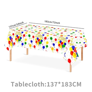 Macro shot of waterproof PEVA birthday tablecloth with colorful balloons and Happy Birthday print