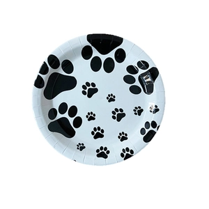 Round disposable paper plates featuring black paw prints for dog theme party decorations