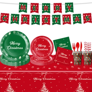 Detail view of Christmas party tableware set with stripes, paper plates and banners