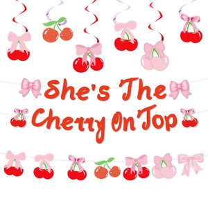 Detail of red glitter She's The Cherry On Top banner and cherry charms with pink bows