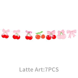 Close-up of cherry and bow party banners featuring 7 pieces of red and pink hanging ornaments