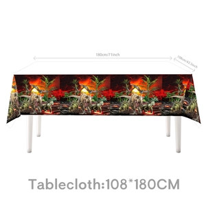 Detailed view of the 108x180cm dinosaur party tablecloth with realistic volcano theme