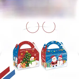 Close-up of triangular Christmas candy gift boxes with festive snowman and Santa designs