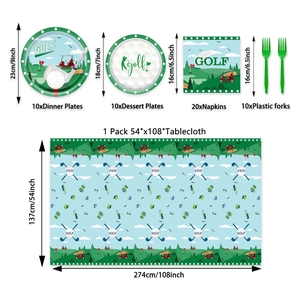 Flat lay of golf party tableware set with green plates, napkins, forks, and tablecloth