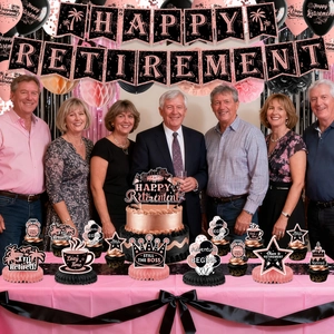 Rose gold Happy Retirement party decoration set with banners and honeycomb centerpieces