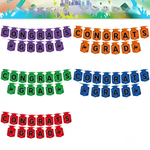 Detailed view of Congrats Grad graduation banners in five vibrant colors with cap motifs