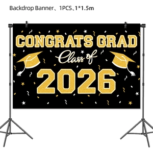 Black and gold 2026 graduation backdrop featuring Congrats Grad text on a tripod stand