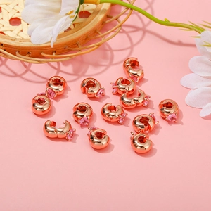 Rose gold DIY charms with pink heart crystals for personalized beaded bracelets