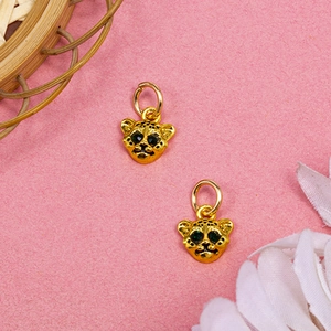 Golden panther head charm with green stone eyes and black spots for bracelets or necklaces