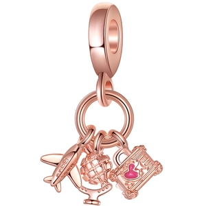 Rose gold travel charm set featuring detailed airplane, globe, and pink heart suitcase