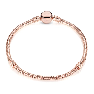 Elegant rose gold snake chain bracelet with classic round clasp on white background