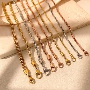 Bohemian gold and silver link chain bracelet set with lobster clasps on stone