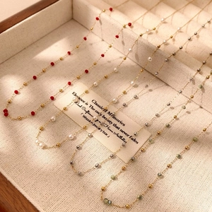 Bohemian style double-layer gold chain necklace with colorful beads in jewelry box