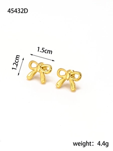 Macro shot of gold bow stud earrings measuring 1.5cm by 1.2cm with polished finish