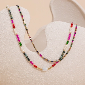 Colorful beaded necklace with natural stones and white rectangular gemstone pendant