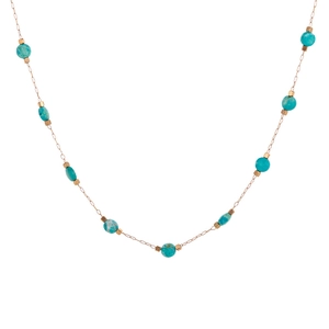 Gold chain necklace featuring turquoise stone beads in a minimalist elegant design