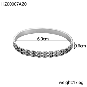 Macro view of silver titanium steel bangle showing 6.0cm inner diameter and anchor chain detail