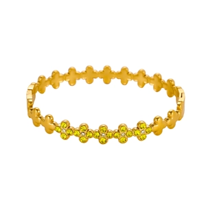 Macro-opname van gouden klaverarmband met fonkelende gele en witte zirkoonstenen