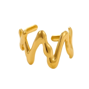 Macro shot of minimalist gold liquid metal wave ring with high-gloss mirror finish