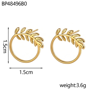 Detail view of gold olive leaf hoop earrings with 1.5cm size and 3.6g weight specs
