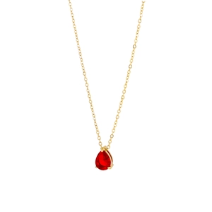 Detail of elegant gold necklace featuring a pear-cut red zircon teardrop pendant