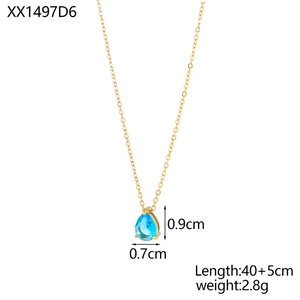 Detailed view of pear-shaped blue zircon pendant on 18K gold-plated stainless steel chain