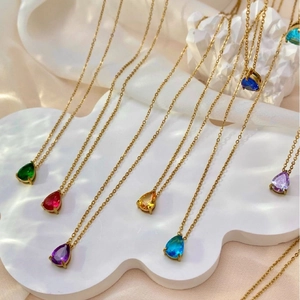 Minimalist gold chain necklace with colorful pear-shaped teardrop gemstone pendants