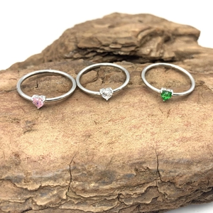 Three-piece heart-shaped colorful gemstone ring set in titanium steel with 18k gold plating