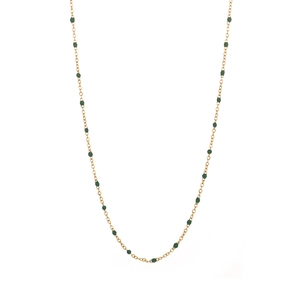 Detailed close-up of slender gold chain necklace with dark green resin beads for women