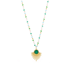Close-up of bohemian beaded necklace with green gemstone sun pendant and colorful beads