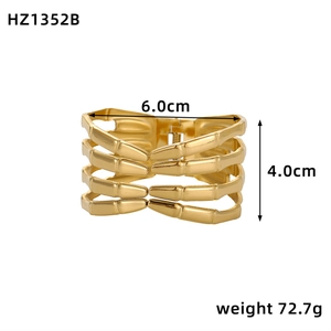 Unique gold cuff bracelet with human rib bone design and spring hinge closure