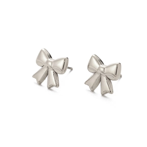 Detailed view of silver bow-shaped stud earrings with polished finish and butterfly design