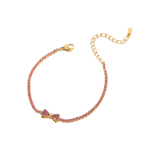 Detail view of pink crystal tennis bracelet with a golden bow knot and adjustable chain