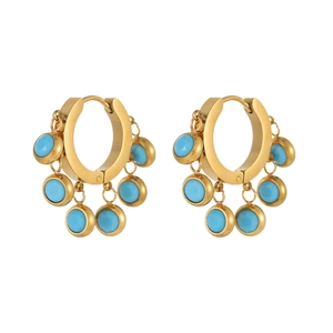 Detailed shot of golden hoop earrings with five turquoise pendants in a boho style