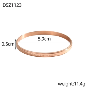 Macro detail of rose gold bracelet with dimensions 0.5cm width and 5.9cm inner diameter