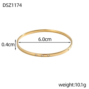 Detail of gold-plated bangle with small inlaid crystals, 6.0cm diameter and 0.4cm width