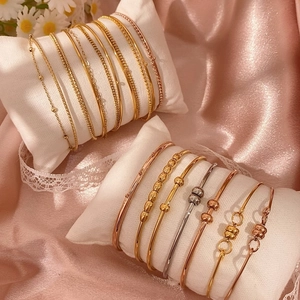 Set di bracciali eleganti con catena a sfere in oro, oro rosa e argento lucido