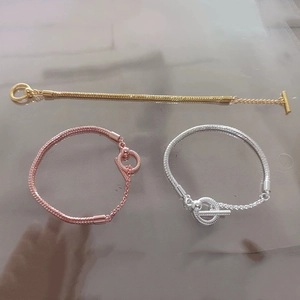Silver, gold and rose gold snake chains with heart-shaped T-bar toggle clasps for women