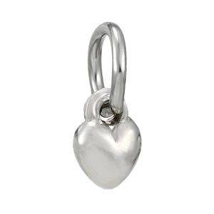 Macro view of a silver heart-shaped hollow pendant charm with a polished metallic finish