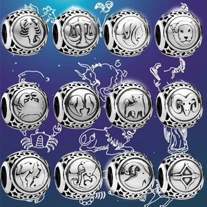 Complete set of 12 zodiac charms in silver finish with star cutout details