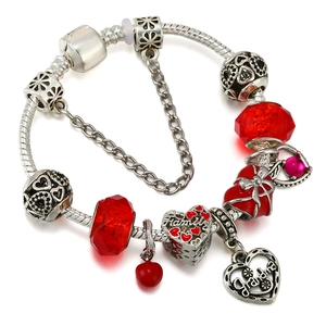 Silver snake chain bracelet featuring red crystal beads and Family heart charms