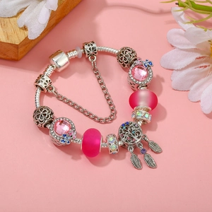 Pink bohemian beaded charm bracelet with silver snake chain and feather dreamcatcher pendant