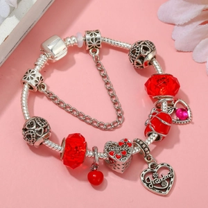 Silver snake chain charm bracelet with red glass beads and Grandma Family heart pendants