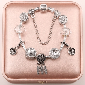 Silver plated snake chain bracelet with heart charms and dreamcatcher pendant for women