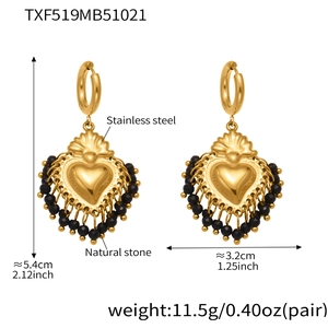 Detailed view of golden heart earrings with black stone tassels and sizing dimensions