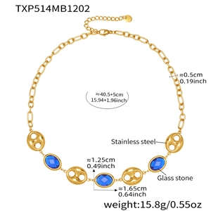 Detail of 18k gold plated stainless steel necklace with blue glass stones and oval links