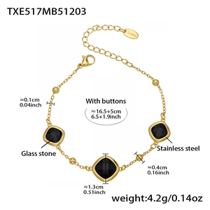 Detail view of gold stainless steel bracelet with square black glass stones and dimensions