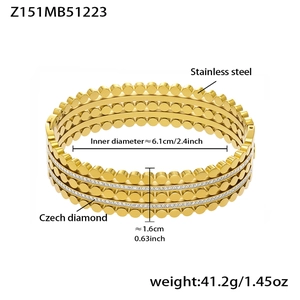 Detail view of 18k gold plated stainless steel multi-layer bangle with Czech diamonds